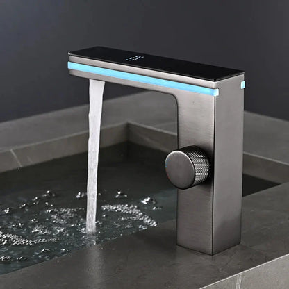 Modern matte black and brushed steel single hole deck mounted bathroom faucet with illuminated blue led strip for cold water