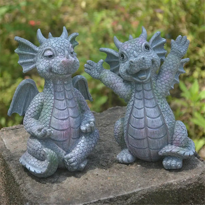 Two gray dragon dino garden sculpture figurines with detailed scales for fun dinosaur decor by decorbites dino garden