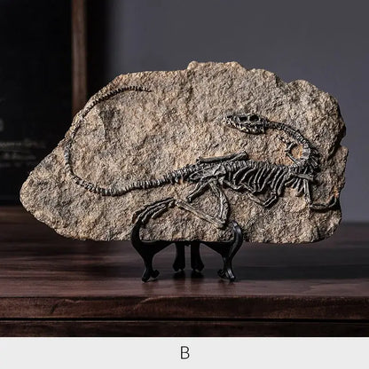Decorbites dinosaur fossil resin craft sculpture features a fossilized dinosaur skeleton in gray textured rock for office decor