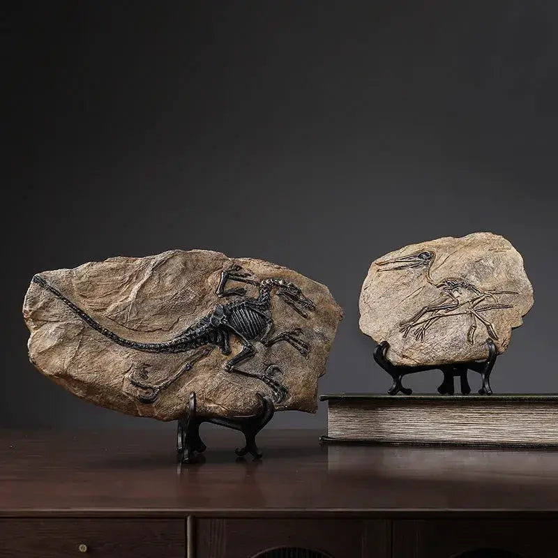 Two fossilized dinosaur skeletons in stone slabs displayed on black stands dinosaur fossil resin craft decorbites desk decor