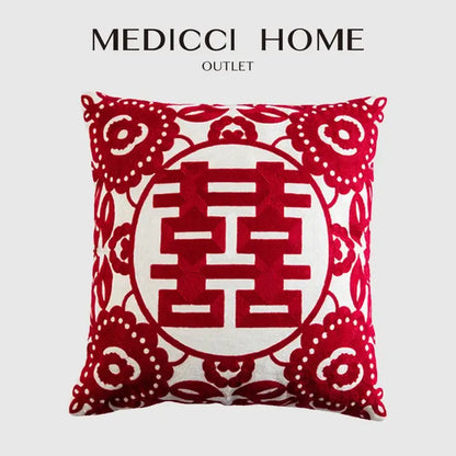Red velvet lumbar pillow with double happiness embroidered red symbol and intricate floral patterns for bedroom decor