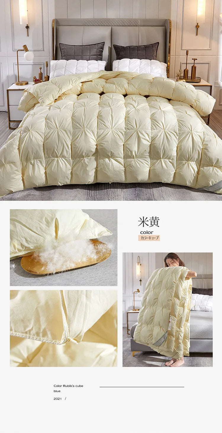 A cream-colored down duvet with soft diamond stitching filled with 95 white goose down for five-star warmth