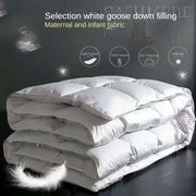White goose down comforter with soft quilted design and maternal infant fabric for warm double single use