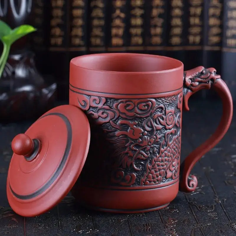 Red ceramic dragon phoenix thermo coffee mug with intricate carvings, matching lid, and sculpted handle by decorbites dragon phoenix