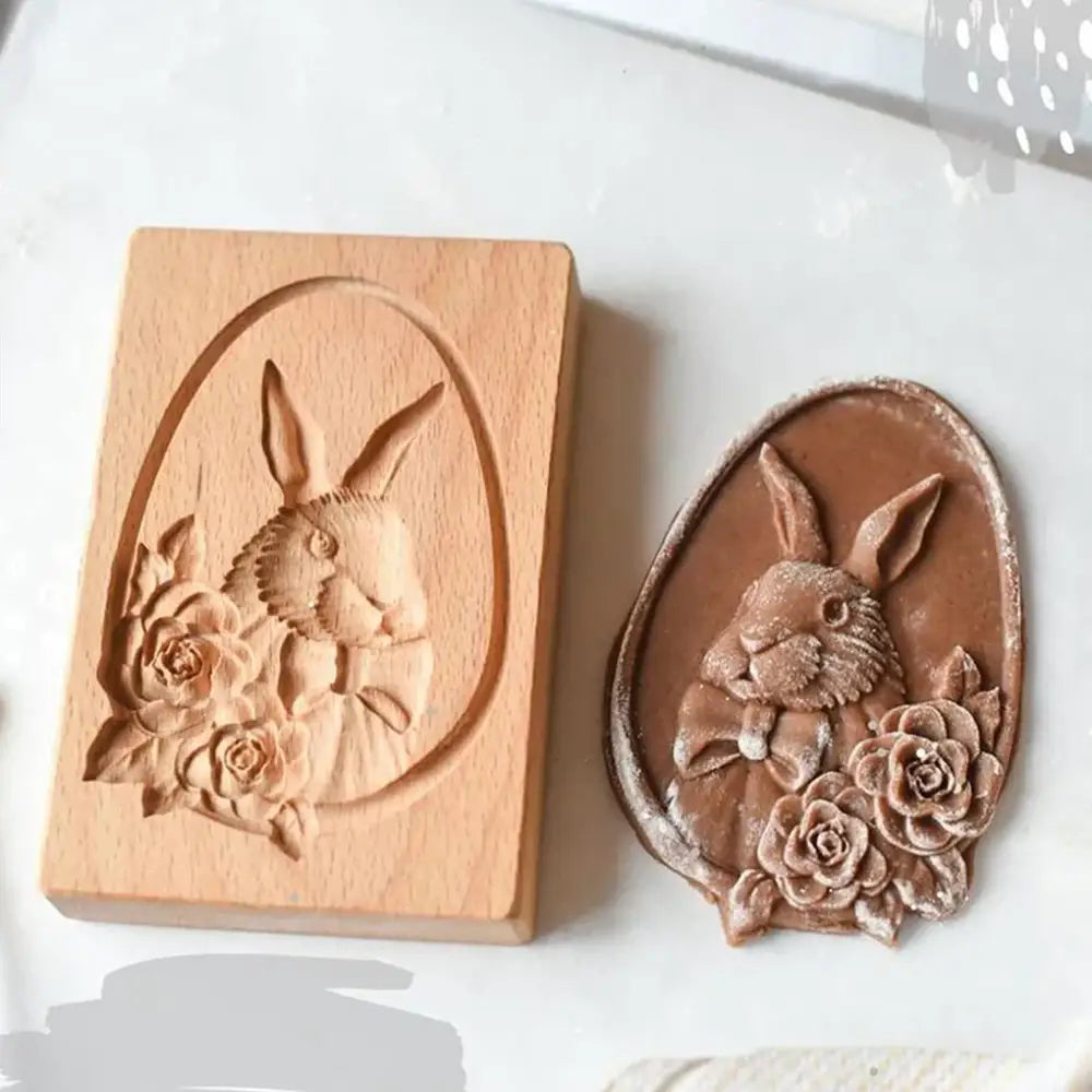 Light brown wooden mold easter bunny with floral design and matching chocolate imprint for gingerbread cake decorbites