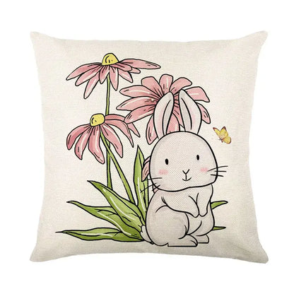 Cream-colored bunny rabbit linen cushion cover with easter bunny rabbit design and pink coneflowers for living room decor