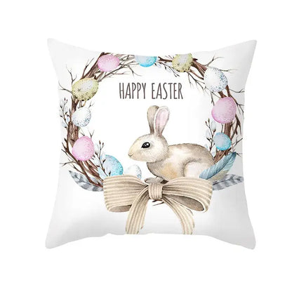 White throw pillow with a watercolor easter rabbit nestled in a wreath on an eggs pillowcase for home decor