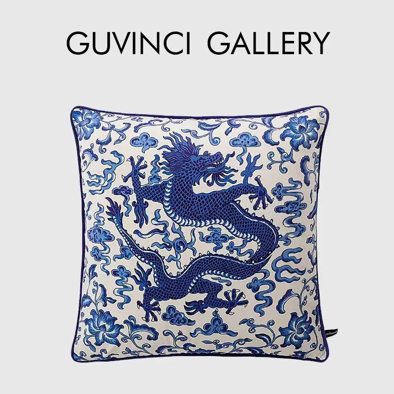 Square velvet pillow cover with indigo blue embroidered dragon and floral motifs on cream background decorbites indigo blue