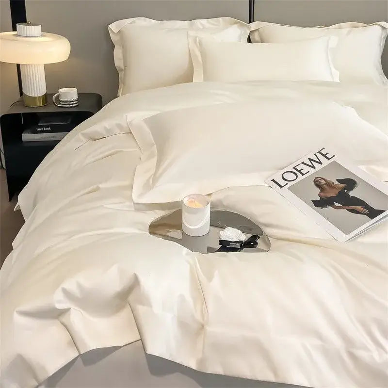Cream-colored decorbites 1000tc egyptian cotton bedding set with satin duvet cover and fitted sheet with pleated edges