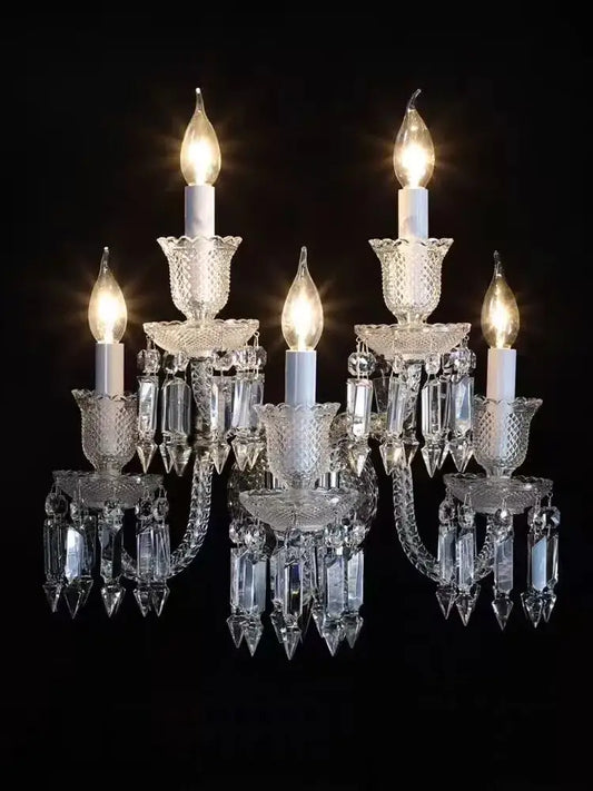 Elegant 5-light crystal wall lamp with lit candle bulbs and faceted crystal droplets for bedroom and aisle decorbites decor