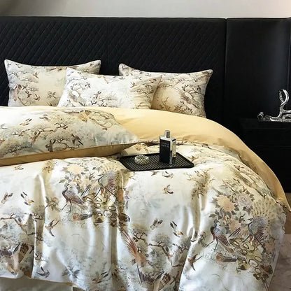 Elegant cream-colored satin bedding set with intricate bird floral patterns in colorful egyptian cotton by decorbites