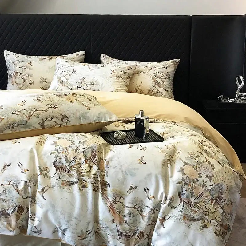 Elegant cream-colored satin bedding set with intricate bird floral patterns in colorful egyptian cotton by decorbites