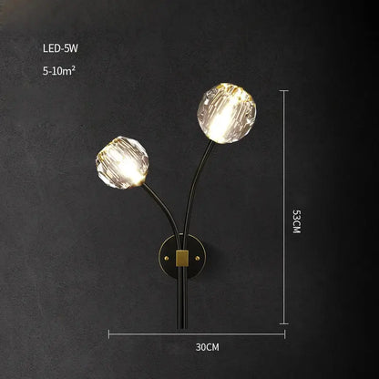 Elegant black and gold wall sconce with two crystal globe shades and decorbites crystal stone wall lamp base