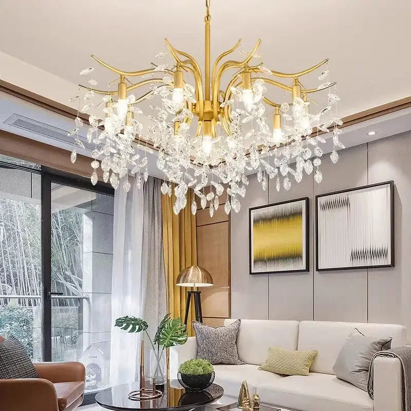 Elegant black crystal chandelier featuring gold-toned branching arms and cascading clear crystal droplets for dining room lighting