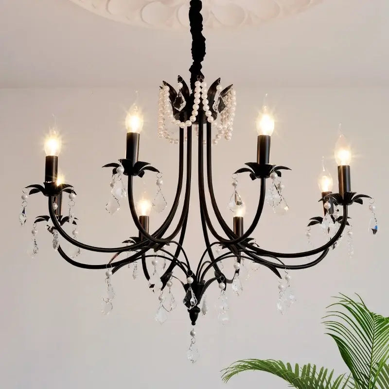 Elegant black crystal chandelier pendant light with wrought iron, crystal droplets, and pearl accents for living room