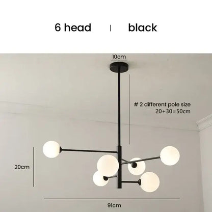 Elegant black gold glass ball chandelier with six spherical white globe lights for living room lighting