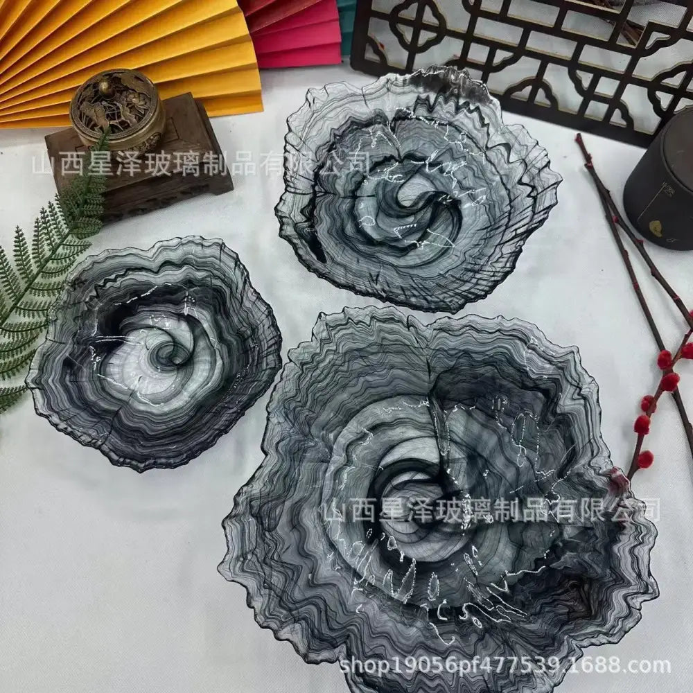 Three black and white layered glass plates with swirling patterns by decorbites elegant flower for dining room snack use
