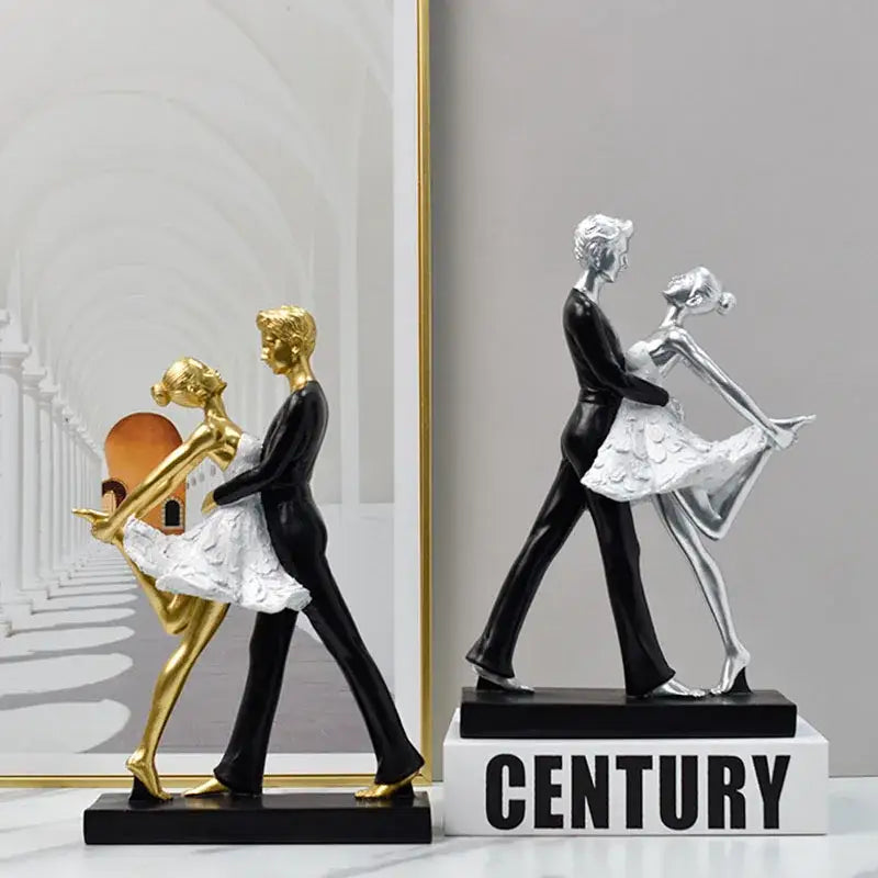 Elegant black and white ballet dance girl double resin statue featuring a golden and black dancing couple for living room decor