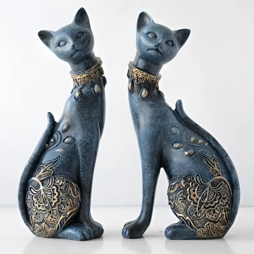 Two elegant dark blue resin decorbites cat statues with gold leaf patterns and beaded collars for living room decor