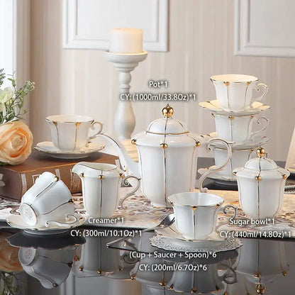 Elegant bone china tea set in white with delicate gold trim and ornate detailing for dining room decorbites elegant bone