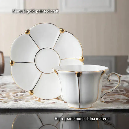 Elegant bone china teacup and saucer set in white with gold trim for refined dining room decorbites elegant bone china