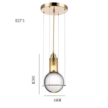 A modern brass pendant light with clear glass globe and e27 bulb socket from decorbites crystal ball led collection