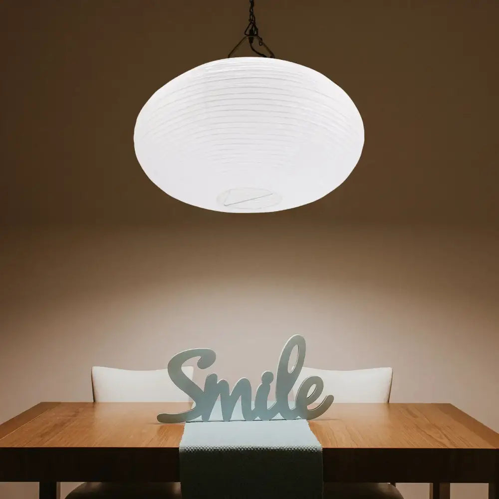 White paper lantern hanging from ceiling complements decorbites elegant column white ribbed floor lamp living room decor
