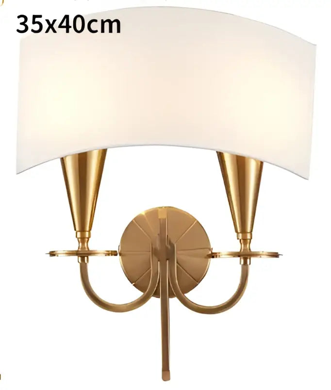 Brass-finished wall sconce with two conical arms and off-white fabric shade for décorbites copper chandelier lights