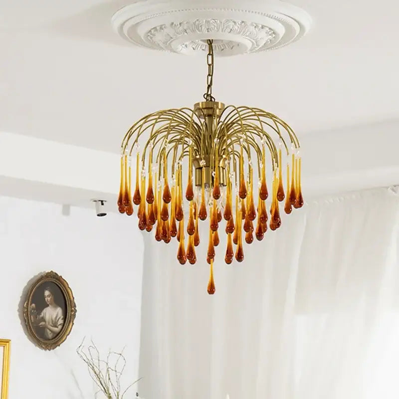 Golden brass decorbites elegant crystal ceiling chandelier with amber and clear glass teardrop pendants for dining room