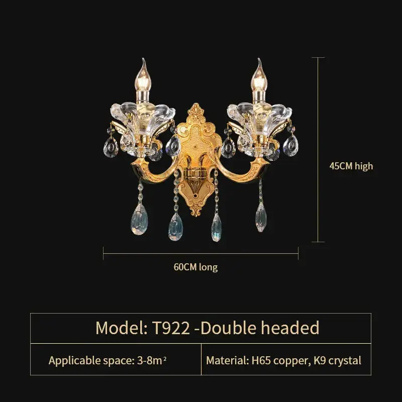 Gold-toned double-headed wall sconce with ornate copper frame and dangling k9 crystals by decorbites elegant crystal
