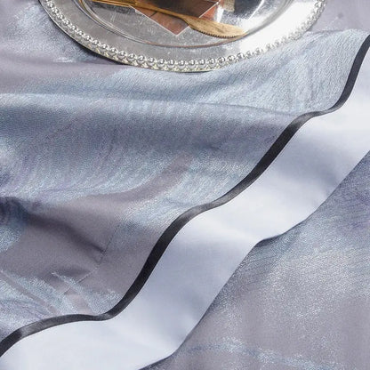 Silver metallic table runner with black satin trim complements elegant feather gray 1500tc egyptian cotton silk bedding set