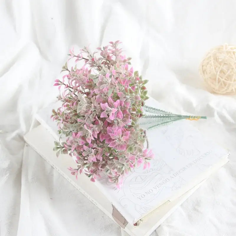 A delicate bouquet of artificial pink and green flocking lover grass with frosty texture for elegant decorbites elegant flocking