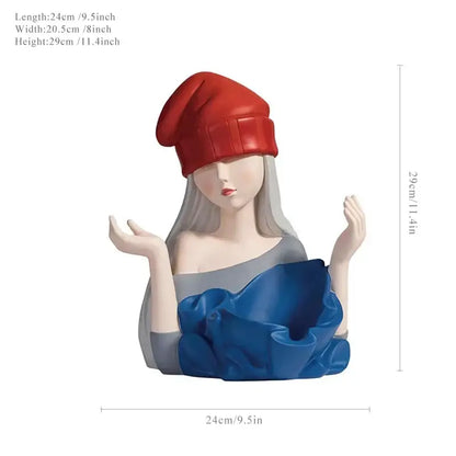 Red beanie wearing elegant girl sculpture wine rack with silver body and blue ruffled base for dining room decorbites decor
