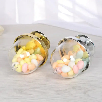 Elegant glass dome candy box tray with two transparent glass decorbites candy boxes filled with pastel marshmallows