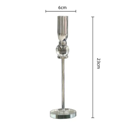 Silver metallic candlestick holder with fluted top and spherical middle, part of decorbites crystal glass dining set