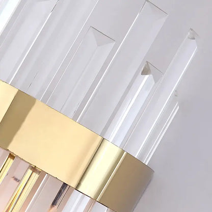 Elegant gold and crystal led wall lamps featuring clear acrylic rods with polished gold-toned metal bands for living space