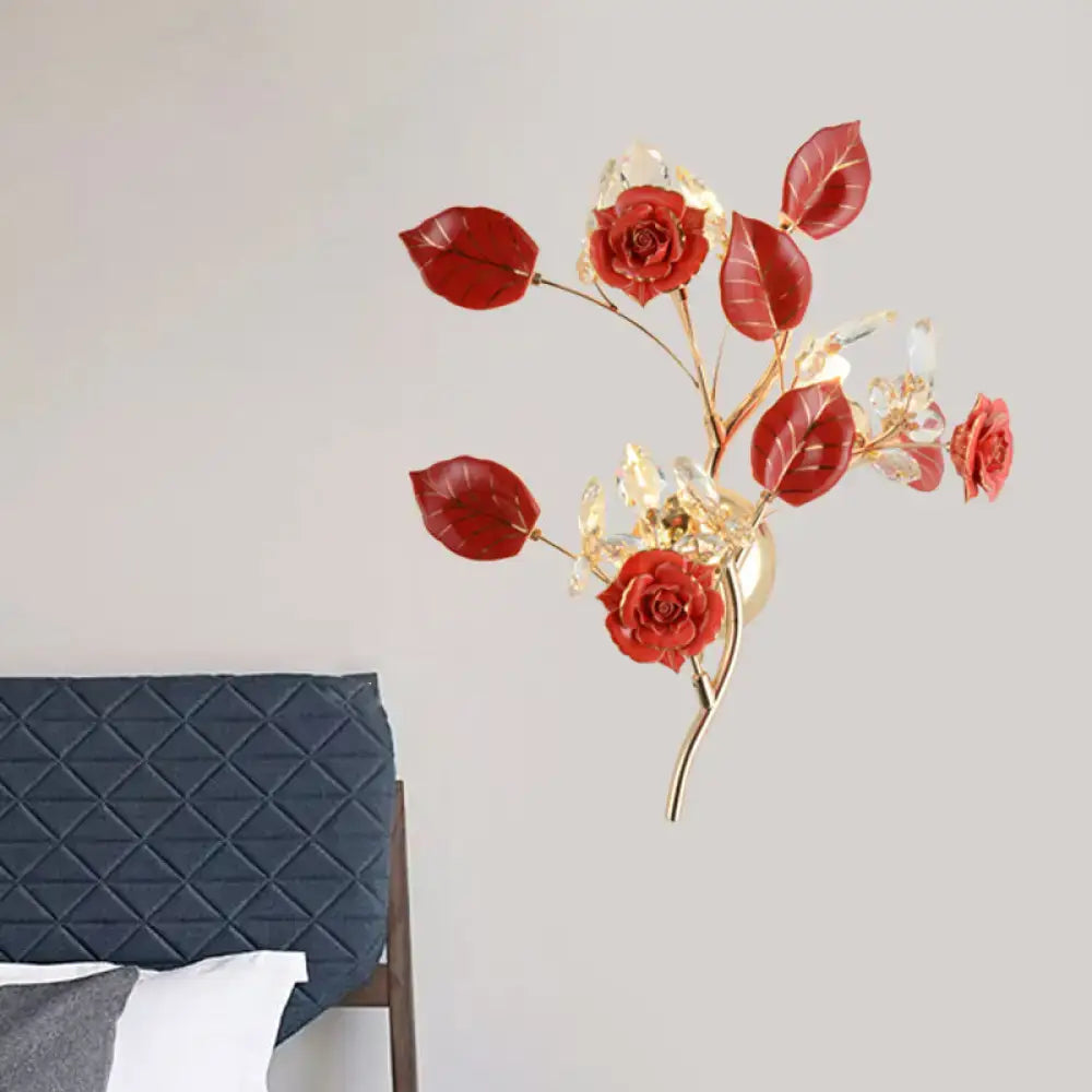 Elegant gold branch wall lamp with vibrant red rose blossoms and clear crystals for direct wired electric bedroom lighting