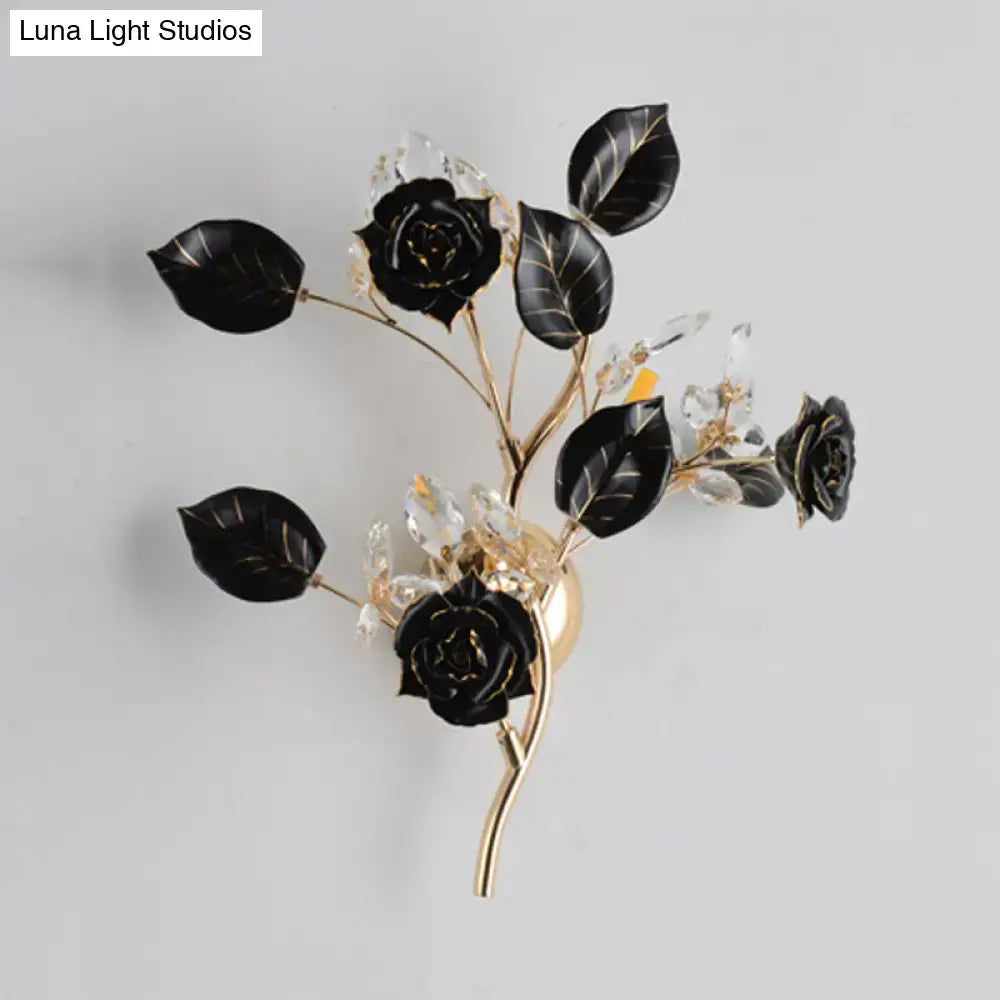 Elegant black rose wall lamp with gold-toned metal branch and clear crystal accents direct wired electric sconce lighting