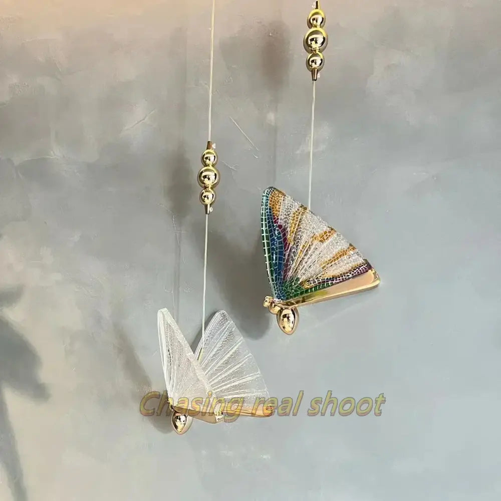 Elegant gold butterfly led pendant light with iridescent multi-colored wings and delicate mesh decor for bedroom decorbites butterfly led