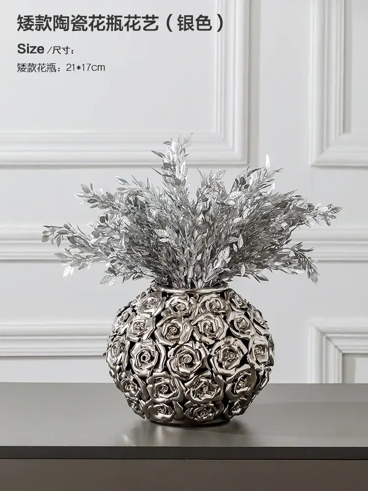 Silver ceramic vase with textured rose pattern and silver-toned foliage in decorbites elegant gold ceramic style centerpiece