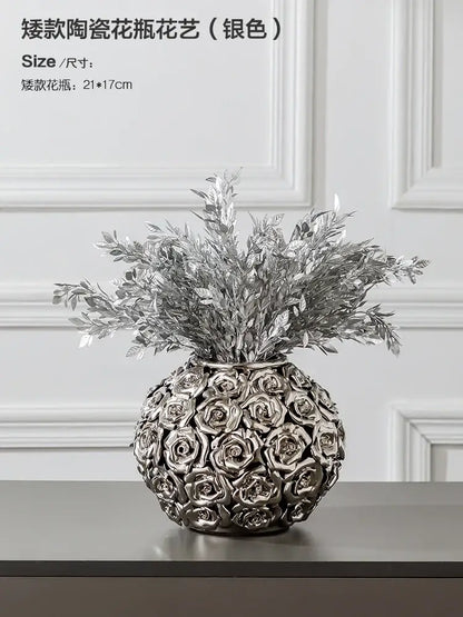 Silver ceramic vase with textured rose pattern and silver-toned foliage in decorbites elegant gold ceramic style centerpiece