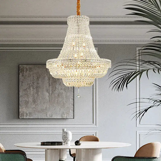Elegant gold and chrome k9 crystal chandelier with cascading clear crystals and warm lighting for dining room decorbites chrome k9 crystal