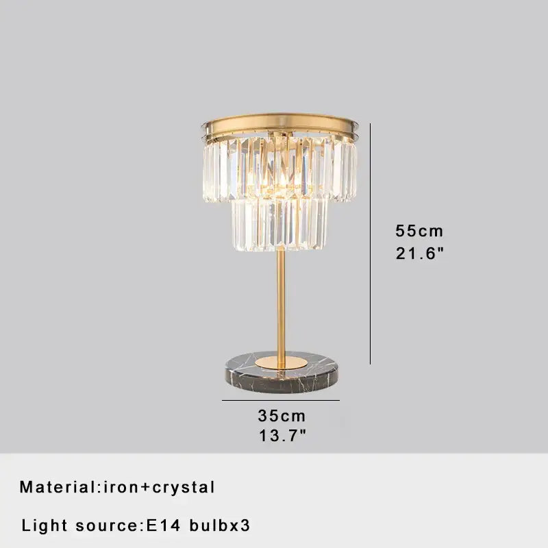 Elegant gold-toned decorbites crystal bar table lamp with cascading crystal tiers and dark marble base for dining room decor