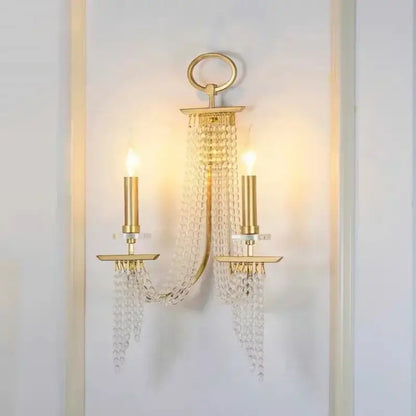Elegant gold crystal candle chandelier with two candle-style lights and cascading beads for dining room decorbites crystal candle