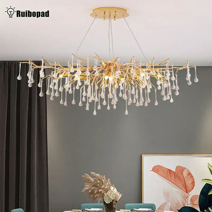 Elegant gold crystal chandelier with branching tree design and clear crystal droplets for living room decorbites elegant gold