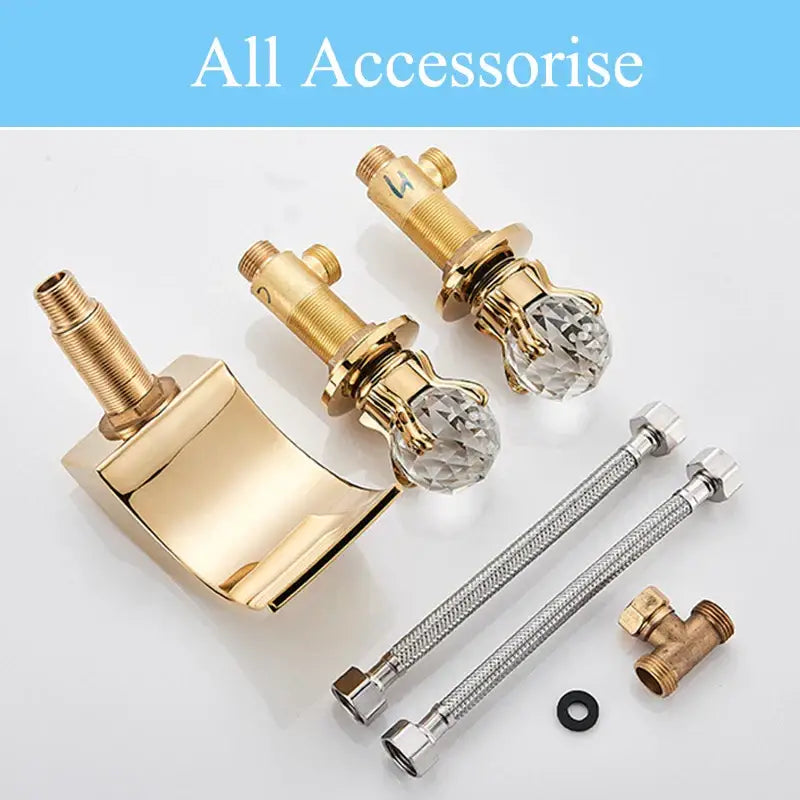 Elegant gold basin faucet set with crystal handles and a sleek modern waterfall design for bathroom use