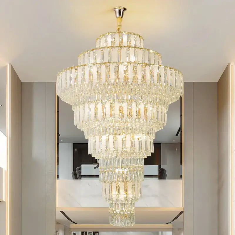 Elegant gold crystal hollow chandelier featuring multi-tiered cascading rectangular prisms for living room lighting