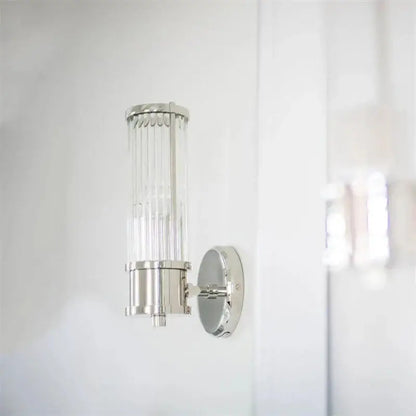 Elegant gold crystal led wall lights with polished chrome finish and vertical glass prisms for modern decorbites crystal led wall lighting