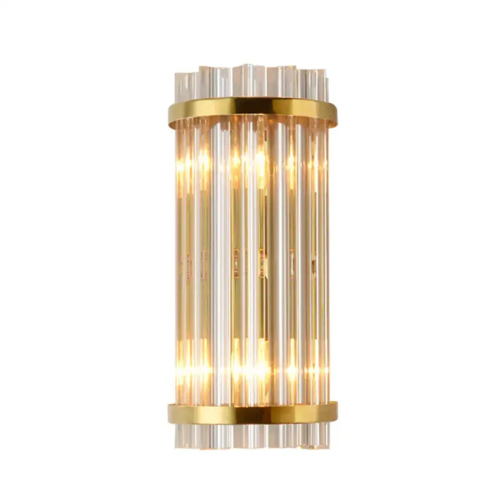 Elegant gold wall sconce light with vertical crystal rods and fluted glass top for living room lighting