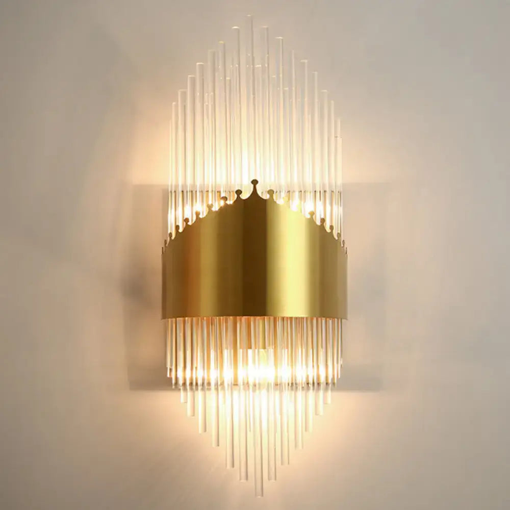 Elegant gold crystal prism wall sconce light with clear glass rods in a radiant crown pattern for living room lighting